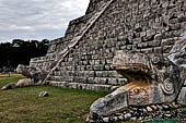 The Pyramid of Kukulcan, or the Castle (el Castillo), the most imposing structure at Chichen Itza. The balustrades of the northern staircase originate from two feathered serpent's heads, effigy of Kukulcan.