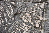 Chichen Itza - Great Ball court. Detail of the bas-reliefs on the side benches.