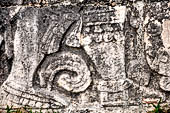 Chichen Itza - Great Ball court. Detail of the bas-reliefs on the side benches.