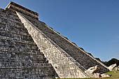 The Pyramid of Kukulcan, or the Castle (el Castillo), the most imposing structure at Chichen Itza. The balustrades of the northern staircase originate from two feathered serpent's heads, effigy of Kukulcan.