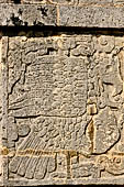 Chichen Itza - The Platform of the Eagles and Jaguars. Bas-relief of a eagle devouring the heart of a defeated victim.