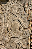 Chichen Itza - The Tzompantli. Bas-relief of a eagle devouring the heart of a defeated victim.