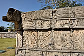 Chichen Itza - The Tzompantli. The platform is crowned by the body of a plumed serpent.