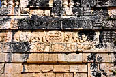 Chichen Itza - The Ball Game, panel of the Upper Temple of the Jaguars decorated with serpents and jaguars.