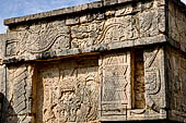 Chichen Itza - The Venus Platform. The tableau on the cornice show plumed serpents with fishes in between the serpent body. Below the representation of Venus.