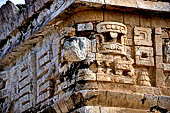 Chichen Itza - The Monjas (Nunnery) palace complex. La Iglesia (the church) this small building displays a profusion of 'big nosed' masks of Chac God.