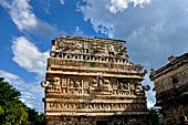 Chichen Itza - The Monjas (Nunnery) palace complex. La Iglesia (the church) this small building displays a profusion of 'big nosed' masks of Chac God.