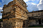 Chichen Itza - The Monjas (Nunnery) palace complex. La Iglesia (the church) this small building displays a profusion of 'big nosed' masks of Chac God.