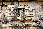 Chichen Itza - The Monjas (Nunnery) palace complex. Eastern patio, eastern facade of the church, the central 'big nosed' mask.