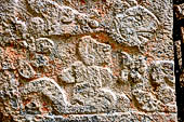 Chichen Itza - Temple of the Panels. Sculptured panels of the south wall of the colonnade, illustrating scenes with personages, animals and plants, both real and imaginary