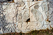 Chichen Itza - The ball court (Gran Juego de Pelota). Friezes of the benches: a skull inside the ball marks the centre.