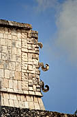 Chichen Itza - The Templo de los Guerreros (Temple of the Warriors). Detail of the southern wall with 'big nosed' masks in a mosaic arrangement.