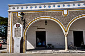 Brightly painted colonnade in Izamal.