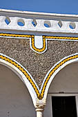 Brightly painted colonnade in Izamal.