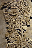 Palenque - The archaeological Museum, Tablet from Temple XVII (reconstruction). Detail of the warrior wearing a war headdress. 
