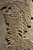 Palenque - The archaeological Museum, Tablet from Temple XVII (reconstruction). Detail of the warrior wearing a war headdress.