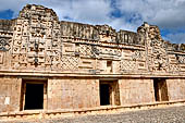 Uxmal - The Nunnery Quadrangle, the North Building. First and second masks stack from left.