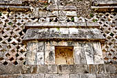 Uxmal - The Nunnery Quadrangle. Frieze of the South building: a traditional hut.