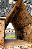 Uxmal - The Nunnery Quadrangle. The great corbelled arch of the South building.