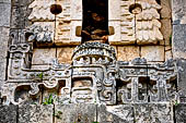 Uxmal - Palace of the Governor, front (East) facade. The frieze is the foot stand of a missing figure and represents a serpent with open jaws.