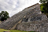 Uxmal - Great Pyramid of the temple of the Macaws: the grand staircase with the side stepped sections.