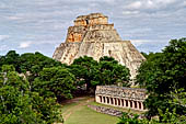 Uxmal - The Magician's Pyramid (el Adivino) with the colonnaded temple of the Iguana in the foreground