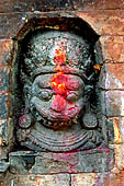 Bhaktapur - Tachupal Tole. Small Bhairab figure.