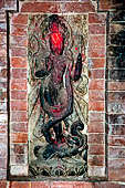 Bhaktapur - Tadhunchen Bahal monastery (xv c), Ganga Devi on makara monster at the side of the monastery entrance. 