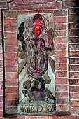 Bhaktapur - Tadhunchen Bahal monastery (xv c), Yamuna Devi on turtle at the side of the monastery entrance. 