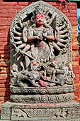 Bhaktapur - Durbar Square - detail of the stone image of  Ugrachandi/Durga (fierce aspect of Parvati). 