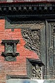 Bhaktapur - Durbar Square. Pashupatinath temple, a pagoda temple style with erotic carvings on the roof struts 