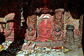 Bhaktapur - Golmadhi Square, where there is a deep hiti and the small three tiered temple dedicated to Golmadhi Ganesh and, nearby, a white chaitya.