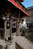 Bhaktapur - Golmadhi Square, where there is a deep hiti and the small three tiered temple dedicated to Golmadhi Ganesh and, nearby, a white chaitya. 