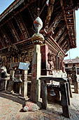 Changu Narayan - pillar with the conch ('sankha') on top (West side of the temple), note the turtle at the base of the pillar. 