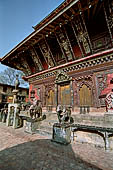 Changu Narayan - the South side of the main temple guarded by a pair of elephant statues.