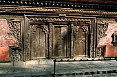 Gokarna Mahadev - richly carved triple wooden doorways.