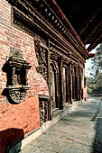 Gokarna Mahadev - richly carved triple wooden doorways.