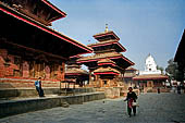 Kathmandu - Durbar Square. Jagannath temple (first from the left), the three levels roof Vishnu Temple, on the background the white spire of Kakeshwar temple.