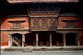 Kathmandu - Durbar Square. Hanuman Dhoka: Lohan Chowk. Carved wooden verandah.