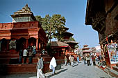 Kathmandu - Durbar Square. On the left two small stone temple and the octagonal Krishna temple behind.