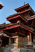 Kathmandu - Durbar Square. The three levels roof Vishnu Temple, on the foreground the small corner shrine of Jagannath temple. 