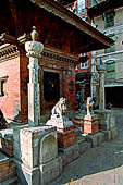 Kathmandu - Durbar Square. Towards the North-east end of the square a small temple dedicated to Vishnu with a statue of Garuda in front marks the start of Makhan Tole the old India-Tibet road.  