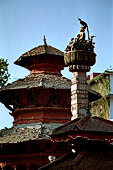 Kathmandu - Durbar Square. King Pratap Malla column, on the background Krishna temple.