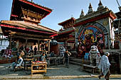 Kathmandu - Durbar Square. Kala Bhairab relief, on the left the Indrapur temple.