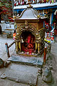 Kathmandu - Indra Chowk a minuscule altar of Ganesh in brass.