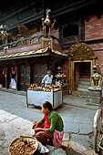 Kathmandu - Indra Chowk with the temple of Akash Bhairab with four metal lions that lean out from the balcony.