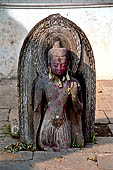 Pashupatinath Temple (Deopatan) - Buddha Statue (6th c.) in front of steps on the east side of the Raja Rajeshvari Mandir near the outer wall.