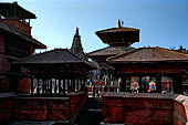 Patan Durbar Square - Mani Mandap pavilions nearby Manga Hiti, the fountain at the Northern end of the square.