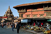 Patan Durbar Square - the expanse on the south side of the square is filled with street sellers, in the  background the Krishna temple. 