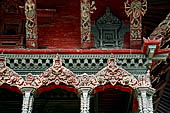 Patan Durbar Square - Hari Shankar temple, the roof struts of the temple are decorated with scenes of damned. 